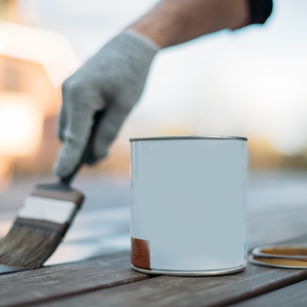 Close-up,,An,Open,Jar,And,A,Man's,Hand,In,A